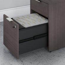 Load image into Gallery viewer, Bush Business Furniture Jamestown 60W Desk with Drawers and Small Storage Cabinet in Storm Gray
